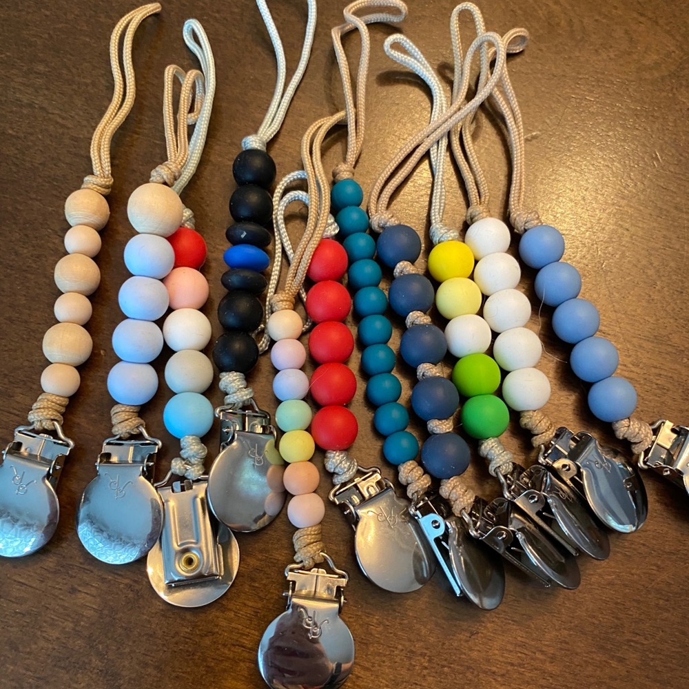 Lot of Ryan and Rose pacifier clips